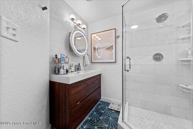 216 Cynthia Ln, Indian Harbour Beach, FL 32937 - full bathroom with tile patterned floors, a shower stall, and vanity