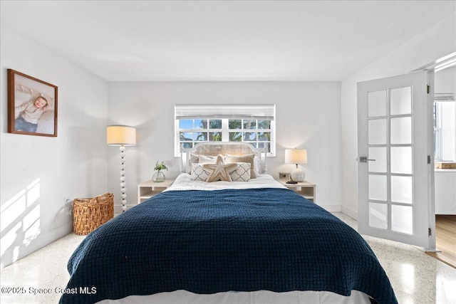 216 Cynthia Ln, Indian Harbour Beach, FL 32937 - bedroom featuring speckled floor