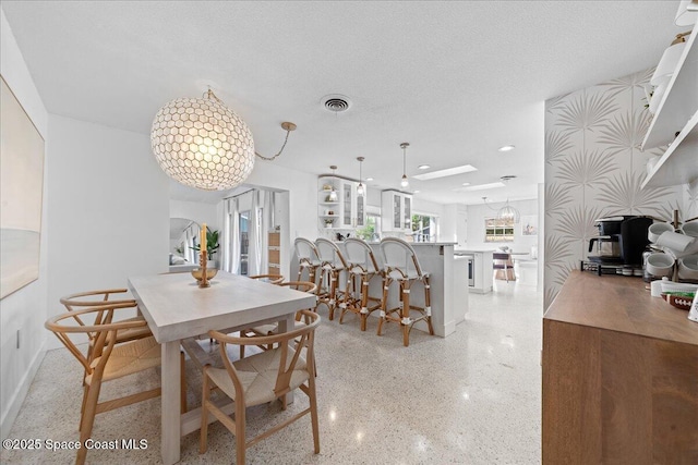 216 Cynthia Ln, Indian Harbour Beach, FL 32937 - dining room with recessed lighting, visible vents, and light speckled floor