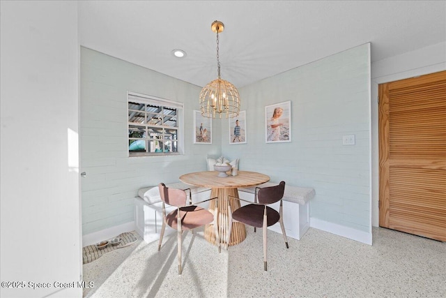 216 Cynthia Ln, Indian Harbour Beach, FL 32937 - dining space with a chandelier, speckled floor, baseboards, and recessed lighting
