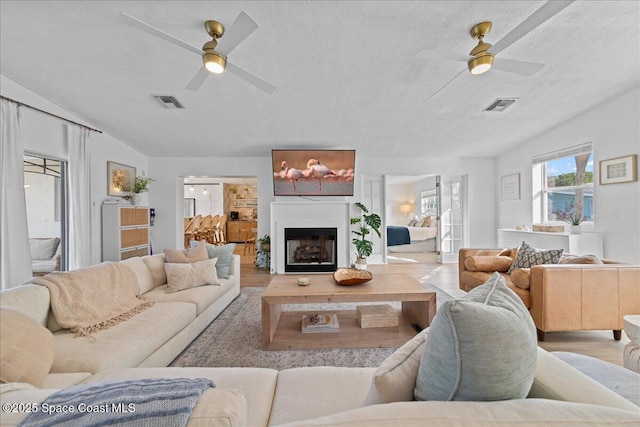 216 Cynthia Ln, Indian Harbour Beach, FL 32937 - living room with visible vents, wood finished floors, and ceiling fan
