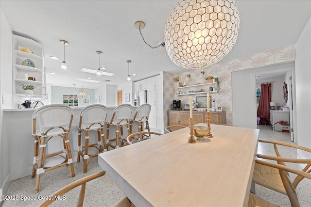 216 Cynthia Ln, Indian Harbour Beach, FL 32937 - dining room featuring a skylight and recessed lighting