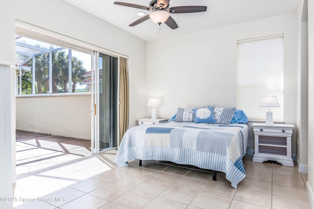 806 Bayside Dr Unit 801, Cape Canaveral, FL 32920 - tiled bedroom featuring ceiling fan
