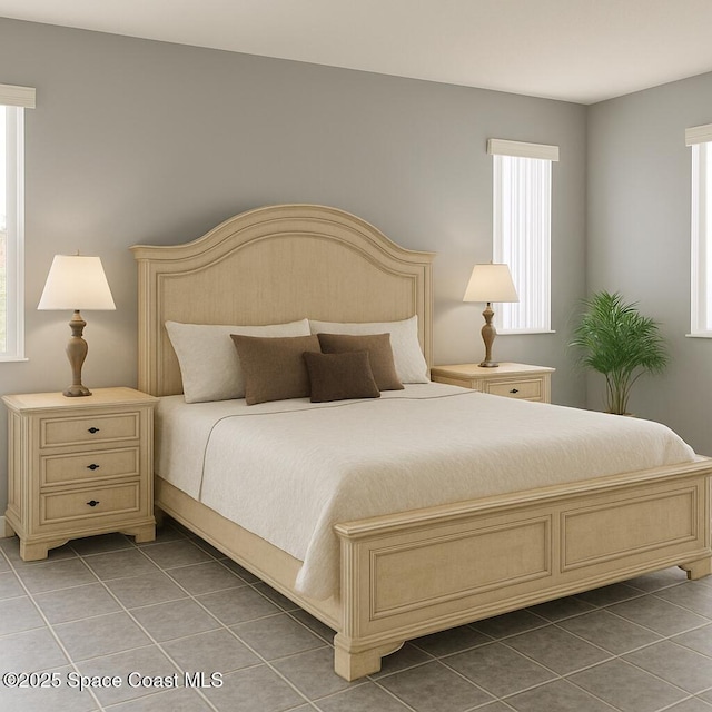5 Fairway Dr Unit 5, Cocoa Beach, FL 32931 - bedroom with tile patterned flooring
