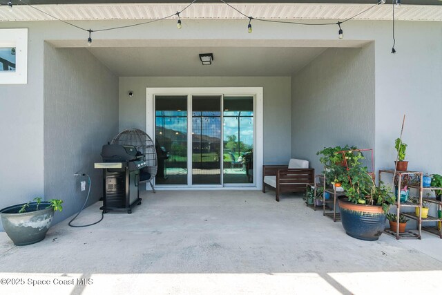 7921 Mocan Ct, Melbourne, FL 32940 - view of patio with a grill