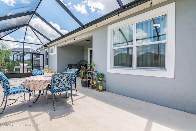 7921 Mocan Ct, Melbourne, FL 32940 - view of patio / terrace featuring outdoor dining space and a lanai