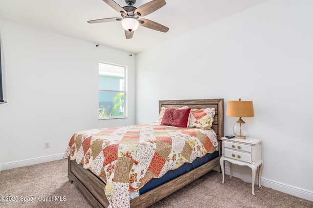 7921 Mocan Ct, Melbourne, FL 32940 - carpeted bedroom featuring baseboards and ceiling fan
