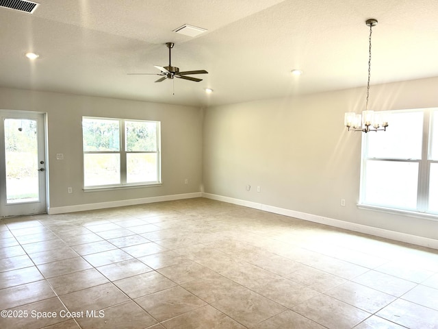 1125 Kylar Dr NW, Palm Bay, FL 32907 - empty room with a chandelier, a ceiling fan, light tile patterned floors, baseboards, and recessed lighting