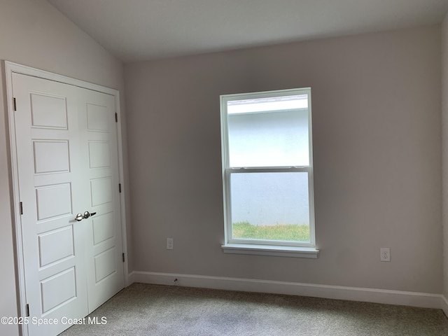 1005 Kylar Dr NW, Palm Bay, FL 32907 - carpeted spare room featuring baseboards