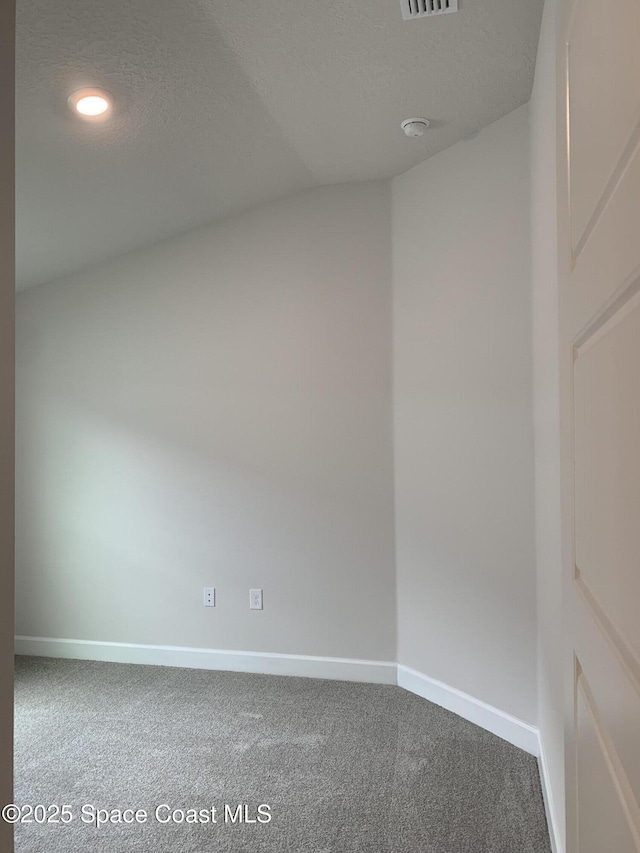 1005 Kylar Dr NW, Palm Bay, FL 32907 - carpeted spare room featuring baseboards, recessed lighting, a textured ceiling, and visible vents