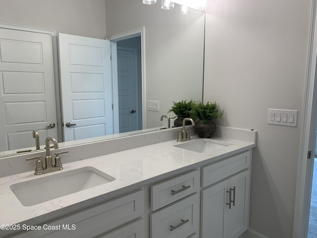 1005 Kylar Dr NW, Palm Bay, FL 32907 - full bathroom with double vanity and a sink