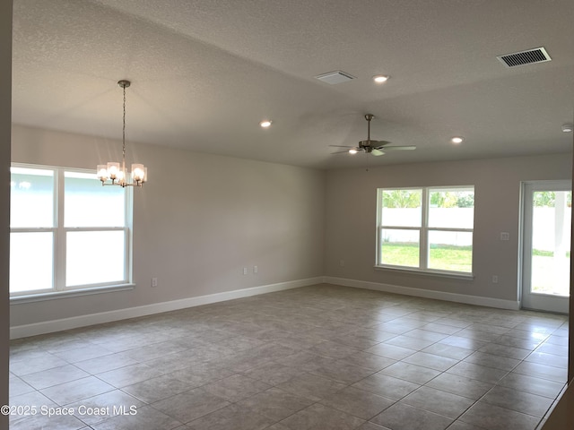 1005 Kylar Dr NW, Palm Bay, FL 32907 - unfurnished room featuring baseboards, recessed lighting, ceiling fan with notable chandelier, and visible vents
