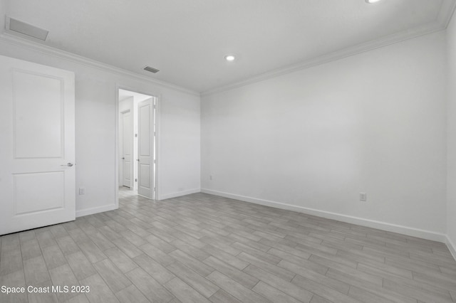 unfurnished bedroom with baseboards, visible vents, recessed lighting, and ornamental molding