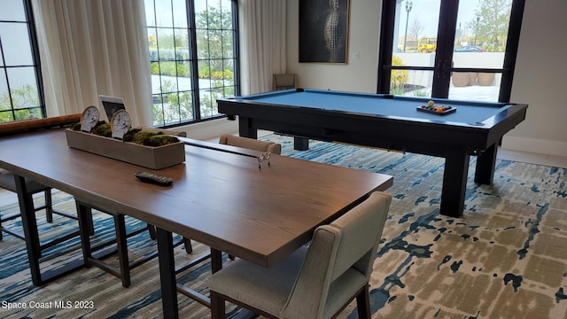 game room featuring pool table and baseboards