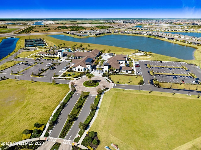 drone / aerial view with a water view