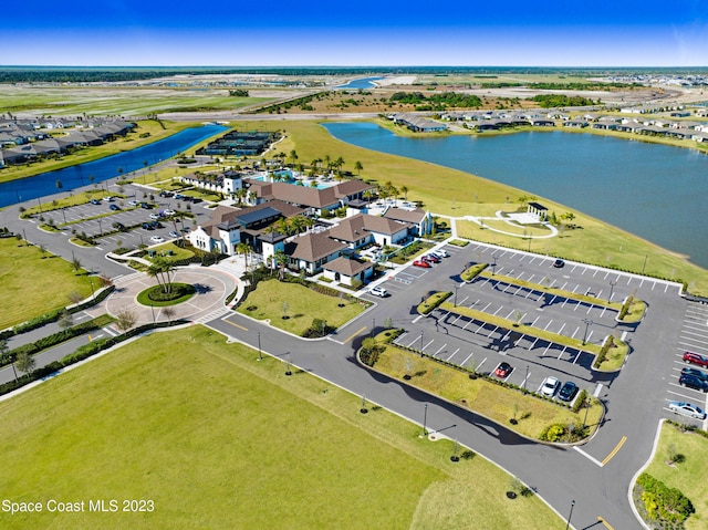 drone / aerial view with a water view