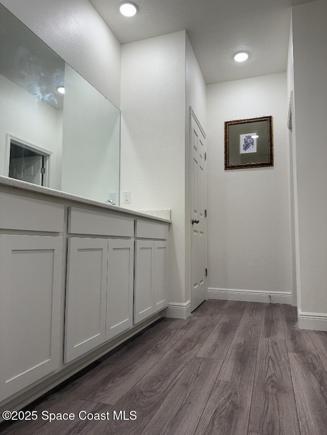1430 Denali St SE, Palm Bay, FL 32909 - bathroom with wood finished floors and baseboards
