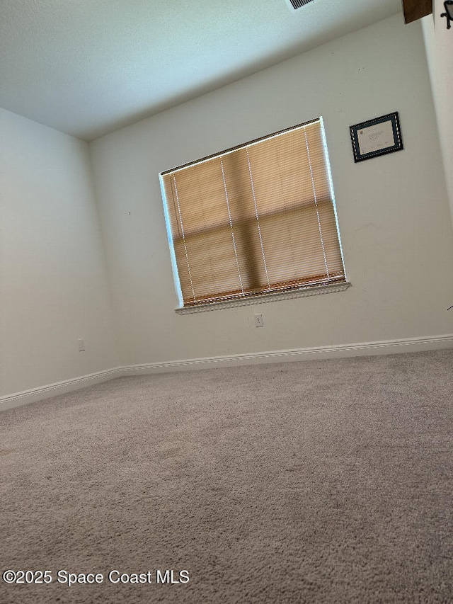 1430 Denali St SE, Palm Bay, FL 32909 - carpeted empty room featuring baseboards