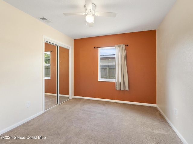 1640 Barna Ave, Titusville, FL 32780 - unfurnished bedroom with a closet, carpet, visible vents, and baseboards