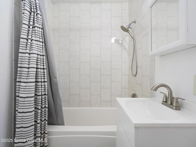 1640 Barna Ave, Titusville, FL 32780 - bathroom with shower / tub combo with curtain and vanity