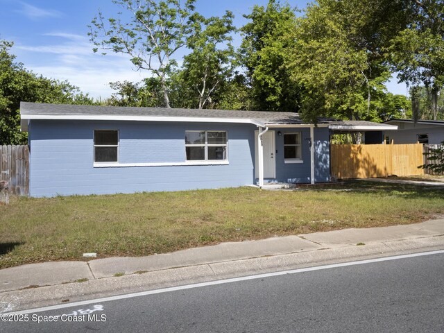 1640 Barna Ave, Titusville, FL 32780 - single story home featuring fence and a front lawn