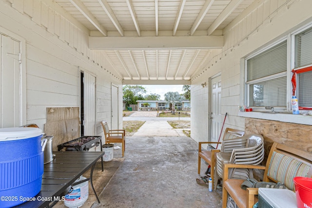 view of patio / terrace featuring a carport