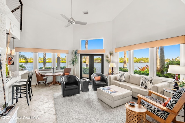 450 Ross Ave, Melbourne Beach, FL 32951 - sunroom / solarium with a water view, visible vents, and a healthy amount of sunlight