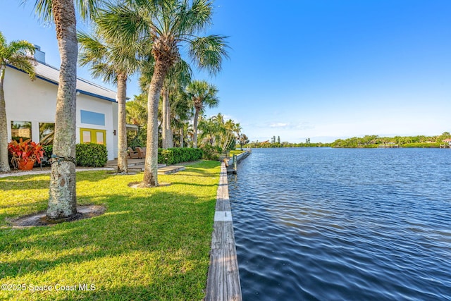 450 Ross Ave, Melbourne Beach, FL 32951 - view of water feature with a boat dock