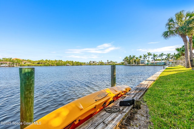450 Ross Ave, Melbourne Beach, FL 32951 - dock area with a lawn and a water view