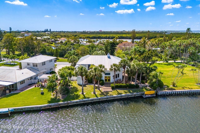 450 Ross Ave, Melbourne Beach, FL 32951 - drone / aerial view featuring a water view