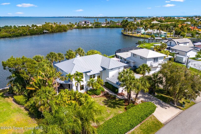 450 Ross Ave, Melbourne Beach, FL 32951 - drone / aerial view featuring a water view and a residential view