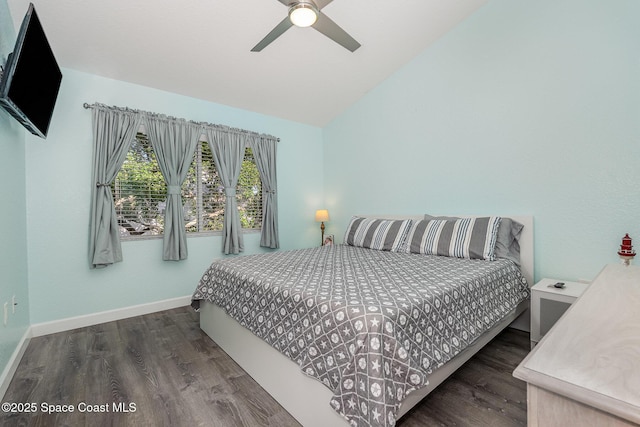 326 Seaport Blvd Unit T95, Cape Canaveral, FL 32920 - bedroom with vaulted ceiling, wood finished floors, baseboards, and a ceiling fan