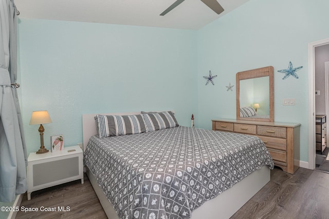 326 Seaport Blvd Unit T95, Cape Canaveral, FL 32920 - bedroom featuring wood finished floors, baseboards, and a ceiling fan