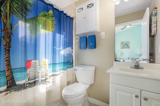 326 Seaport Blvd Unit T95, Cape Canaveral, FL 32920 - full bathroom featuring vanity, toilet, a shower with shower curtain, and baseboards
