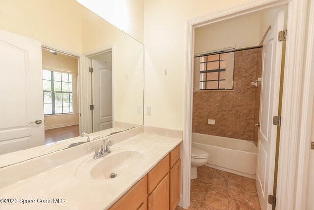 4068 Gardenwood Cir, Grant, FL 32949 - full bathroom featuring vanity, toilet, and shower / bath combination