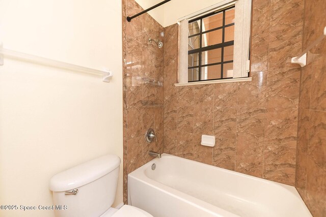 4068 Gardenwood Cir, Grant, FL 32949 - bathroom with toilet and shower / tub combination