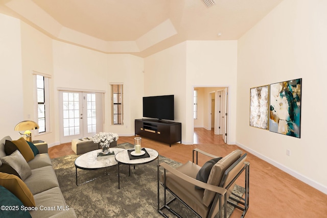 4068 Gardenwood Cir, Grant, FL 32949 - living area with a high ceiling, baseboards, and french doors