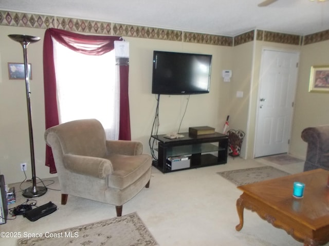 7637 Nianntic Ave Unit T5, Micco, FL 32976 - carpeted living area with ceiling fan