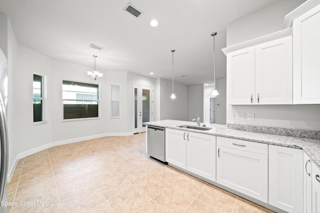 4280 Alamanda Key Dr, Melbourne, FL 32901 - kitchen with a peninsula, white cabinetry, visible vents, dishwasher, and a sink