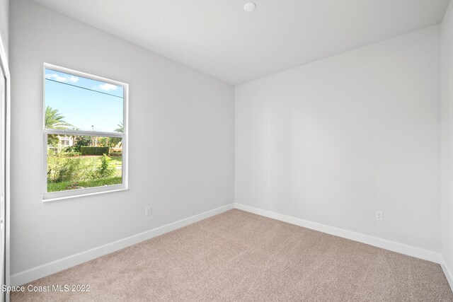 4280 Alamanda Key Dr, Melbourne, FL 32901 - carpeted spare room with baseboards