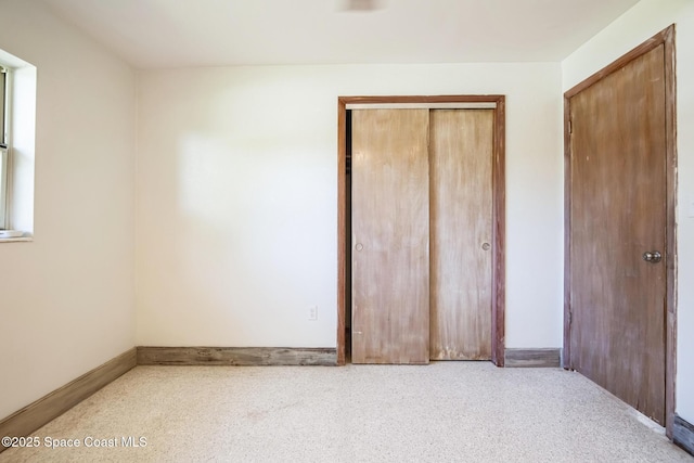 8575 Sheridan Rd, Melbourne, FL 32904 - unfurnished bedroom featuring a closet