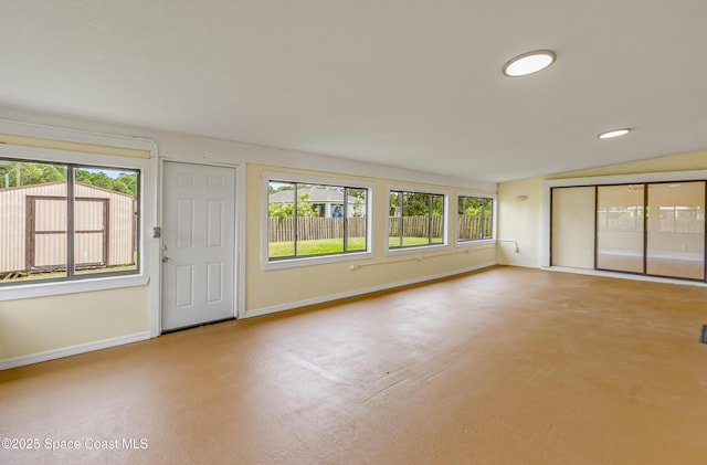 interior space featuring baseboards