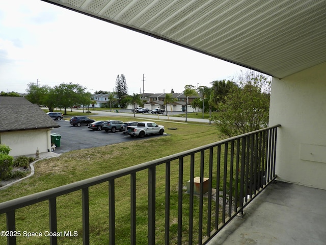 balcony featuring a residential view