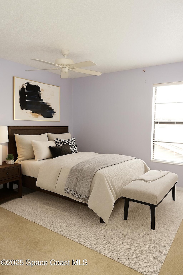 155 Kristi Dr, Indian Harbour Beach, FL 32937 - bedroom with carpet floors and ceiling fan