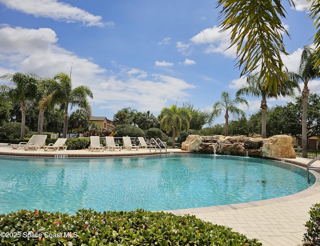 pool with a patio