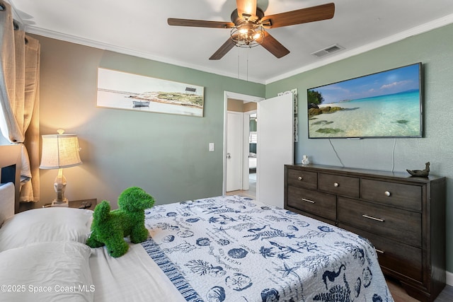 bedroom with ceiling fan, ornamental molding, and visible vents