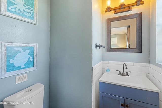 half bath with toilet and vanity