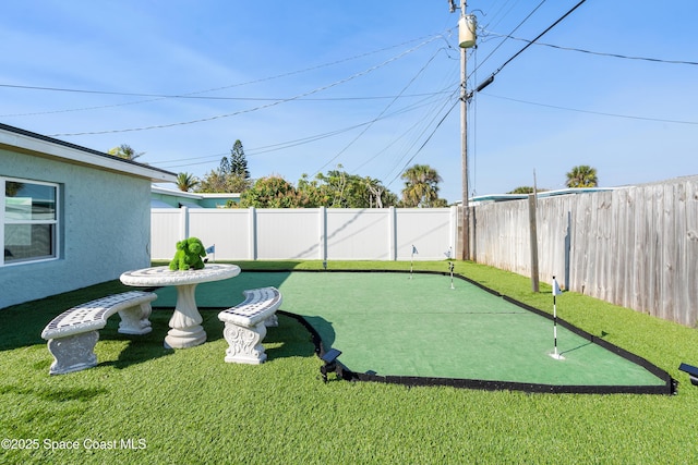 view of yard with a fenced backyard
