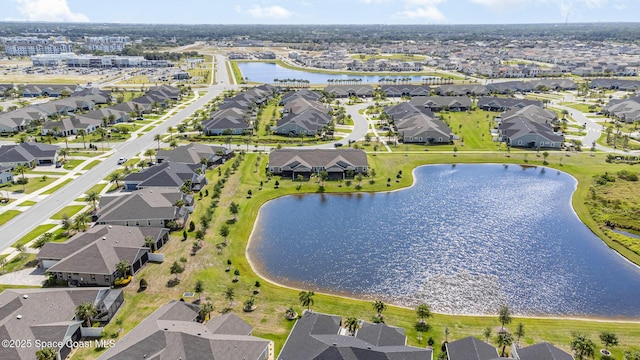 aerial view with a residential view and a water view