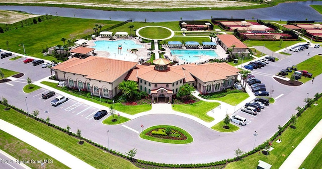 birds eye view of property featuring a water view